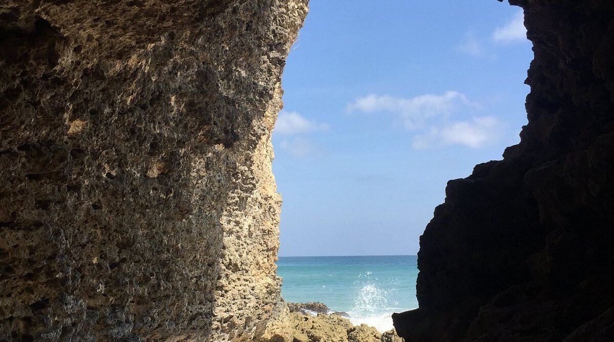 Sunset & Shadows: The Secret Caverns of Tegal Wangi Beach